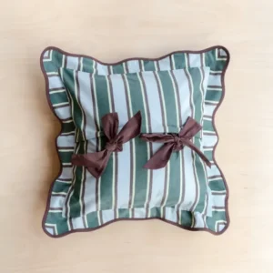 Cotton Cushion Cover in Blue Stripe by TBCo featuring green and blue stripes with brown bows and piping detail